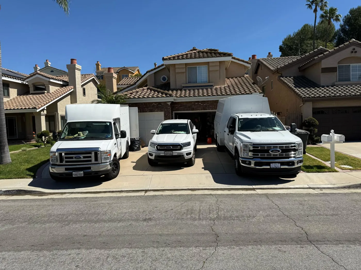 Season Control Heating & Air Conditioning service fleet at a Los Angeles job — serving LA, Orange County and Ventura